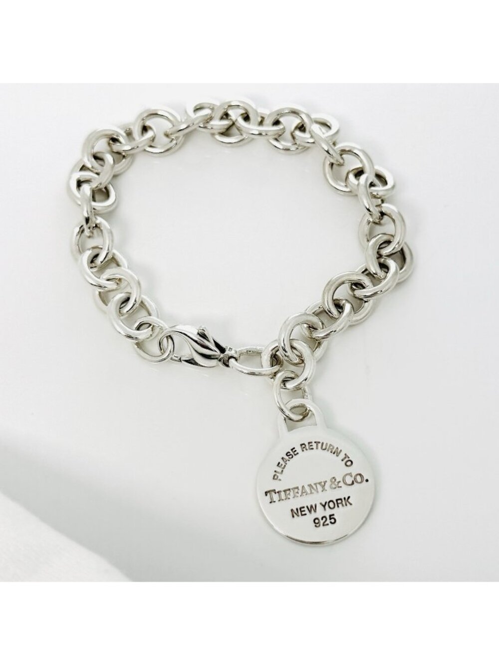 Return to Tiffany & Co. Round Tag Charm Bracelet Mens Unisex in Sterling Silver